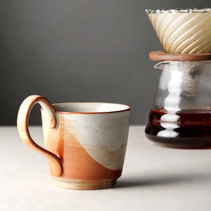 Handmade ceramic mug with large handle