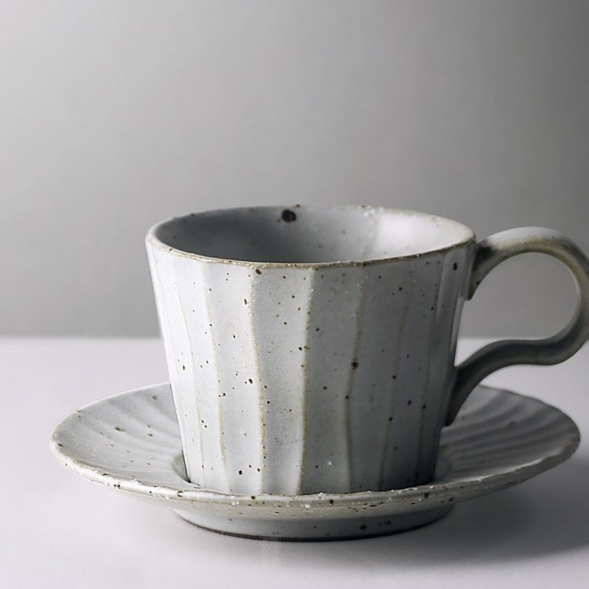 Panelled cup with saucer - sand series
